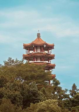 Asian Pagoda Tower Amidst Lush Greenery