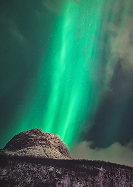 Aurora Borealis over Mountain Landscape