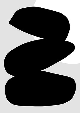 Black Stones Stacked on Gray Background