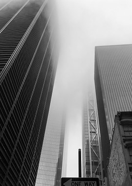 Foggy Cityscape: Black and White Buildings