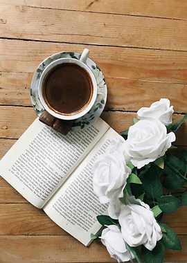 Coffee, Book, and White Roses Still Life