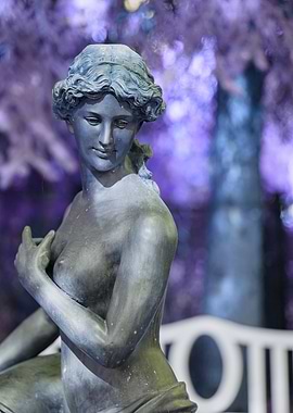Classical Statue in Purple Garden