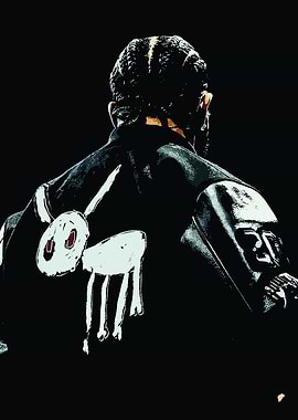 Man with Braids and Graphic Jacket