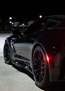 Sleek Black c7 z06 Corvette at Night
