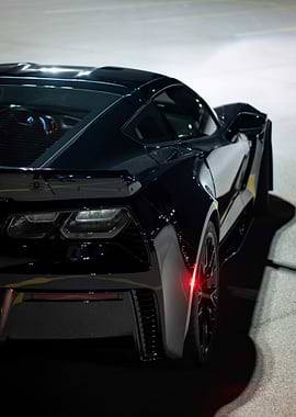 Sleek Black C7 z06 Corvette Sports Car Rear View