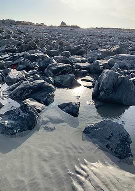 Rocky beach with shallow water
