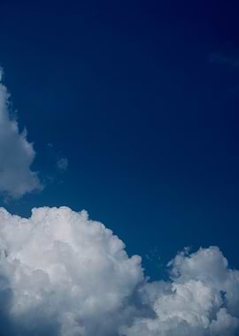 Deep Blue Sky with Clouds