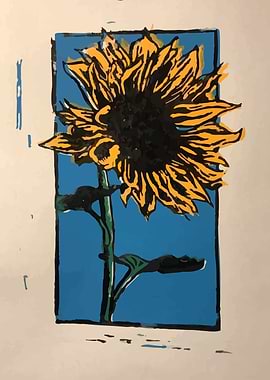 Sunflower linocut print on blue background