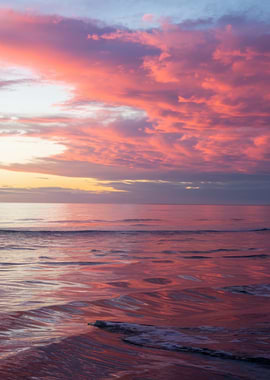 Pink Sunset Over Ocean Waves