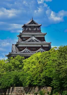 Japanese Castle Surrounded by Lush Greenery