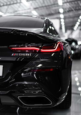Black BMW M850i Rear View