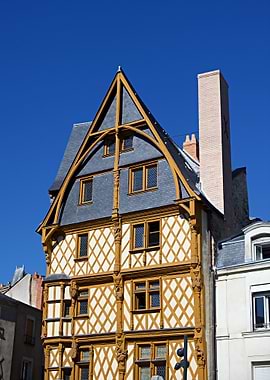Half-timbered building against a blue sky