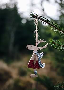 Christmas Reindeer Ornament on Pine Branch
