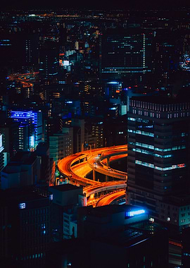 Night Cityscape with Illuminated Highway