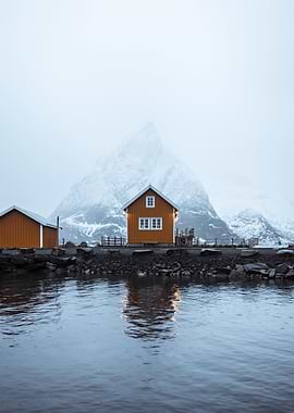 Orange Cabin by Water with Mountain
