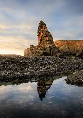 Bretagne, France. Coastal Rock Formation Reflection