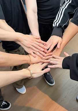Teamwork: Hands Together in Unity