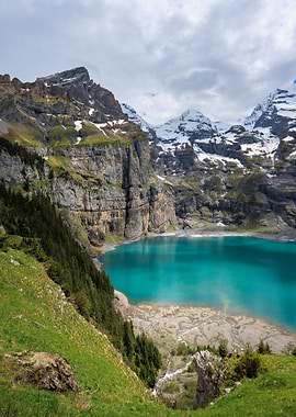 Turquoise Lake Surrounded by Mountains
