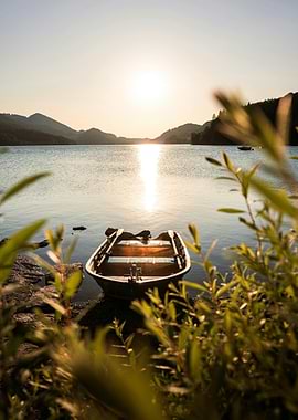 Rowboat on Lake at Sunset