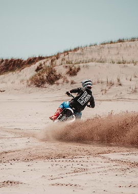 Motocross Rider on Sand Dunes