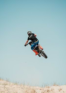 Motocross Rider Jumping High