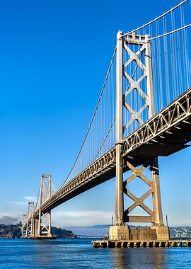 San Francisco Bay Bridge under blue sky