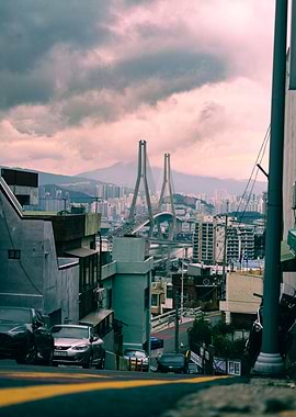 Cityscape with Bridge and Cloudy Sky