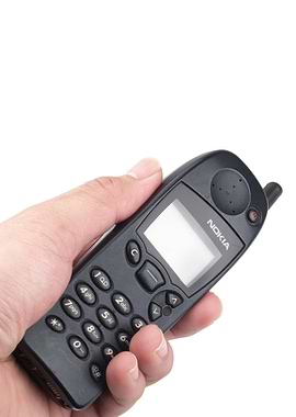 Nokia 5110 phone in hand