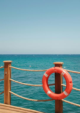 Lifebuoy on a pier by the sea