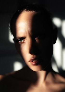 Woman's face in dramatic light