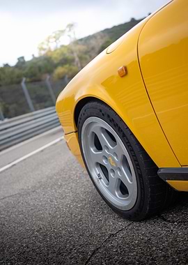 Yellow Car Wheel Close-Up