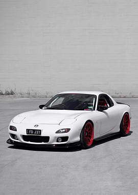 White Mazda RX-7 with Red Wheels