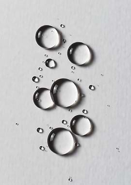 Water droplets on a white surface