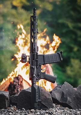 Black AR-15 Rifle with Fire Background