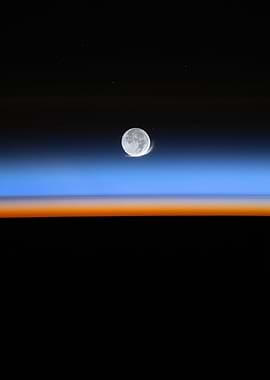 Moon Over Earth's Atmospheric Glow