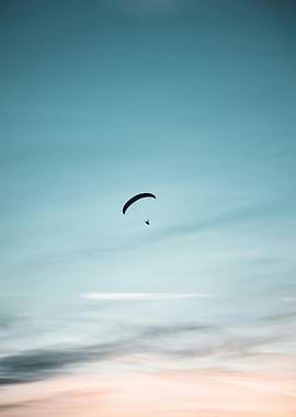 Paragliding in a serene sky