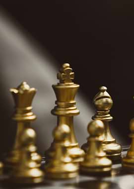 Golden Chess Pieces Close-Up