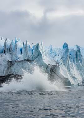 Glacier calving into the ocean