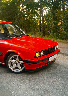 Red BMW E30 on Road