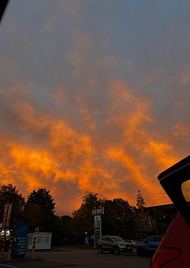Fiery Sunset Over REWE