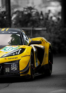Yellow Race Car on Asphalt Road