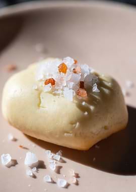 Butter with Salt Crystals on Plate