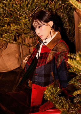 Woman in Plaid Jacket with Christmas Trees