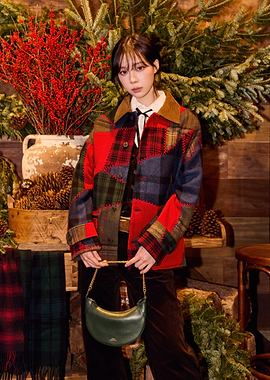 Woman in Patchwork Jacket with Purse