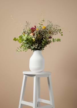 Floral arrangement on a stool
