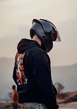 Man with Helmet and Anime Hoodie