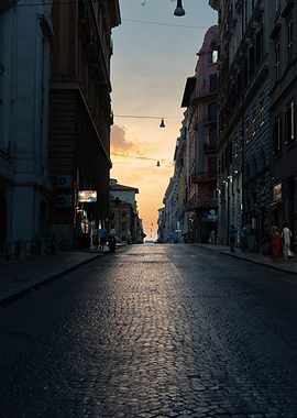 Cobblestone street at sunset in Rome