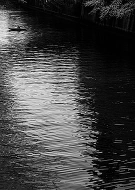 Monochrome River Scene with Small Boat