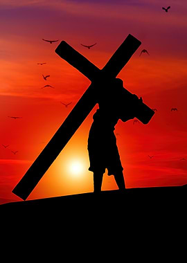 Silhouette of a man carrying cross