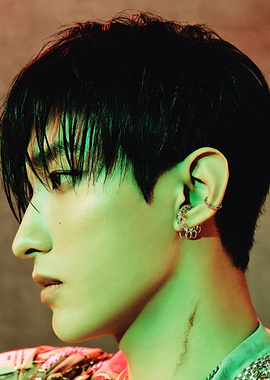 Profile of a man with earrings